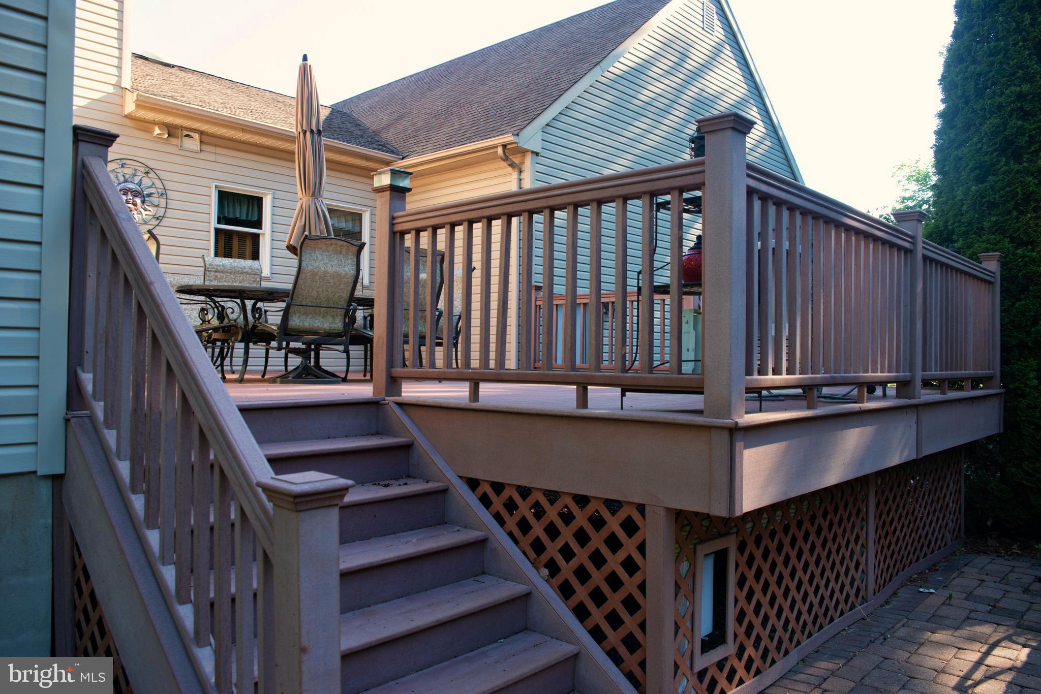 73 Ellisdale Road Allentown, NJ 08501 - Photo 9 of 49 Deck with sliding glass door to great room.