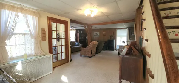 a kitchen with a table and chairs