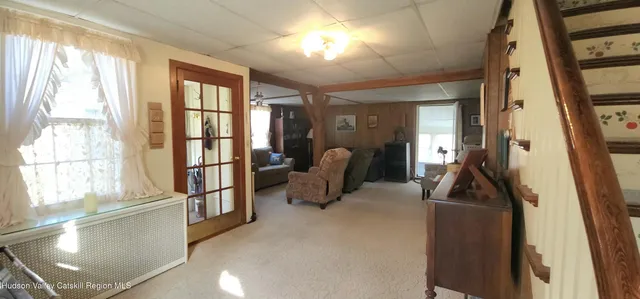 a kitchen with a table and chairs