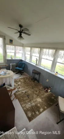a stove top oven sitting inside of a kitchen