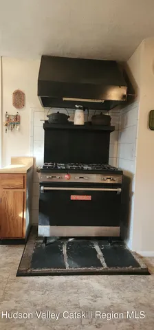 a view of storage and utility room with washer and dryer