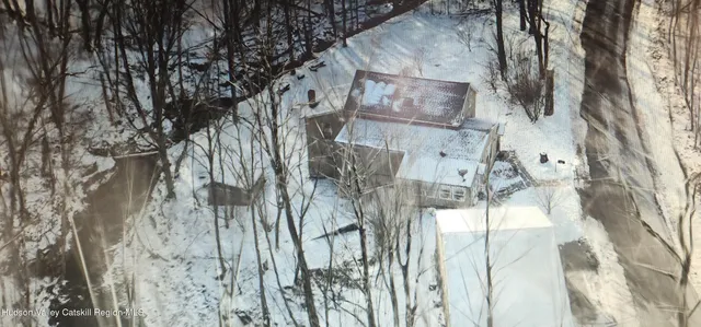 a view of a house with a park