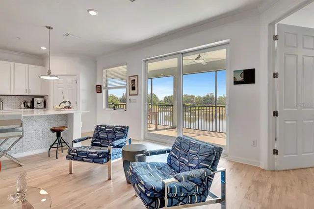 a view of a chairs and table in the patio
