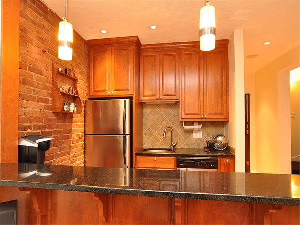 124 Chandler Street, Unit A Boston, MA 02116 - Photo 4 of 14 a bathroom with a sink and a mirror