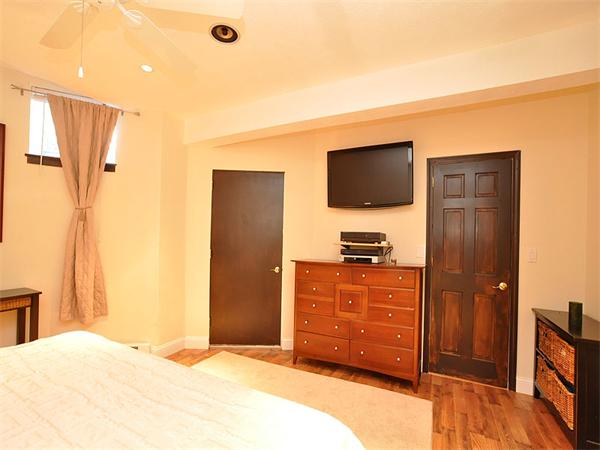 124 Chandler Street, Unit A Boston, MA 02116 - Photo 10 of 14 a bedroom with a bed and a flat screen tv