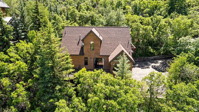 335 Jungfrau Hill Road Midway, UT 84049 - Photo 4 of 34 View from above of property with a heavily wooded area