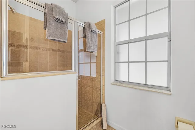 a work room with furniture and a ceiling fan