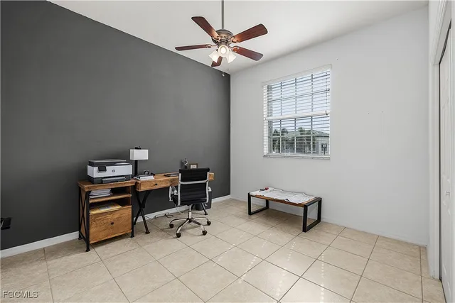 a room with furniture and white walls