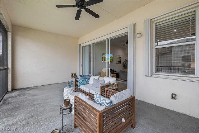 an aerial view of a house with yard swimming pool and outdoor seating