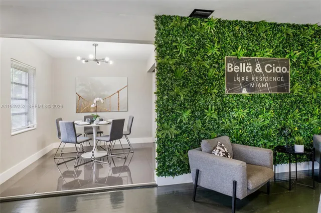 a view of a dining room with furniture window and outside view