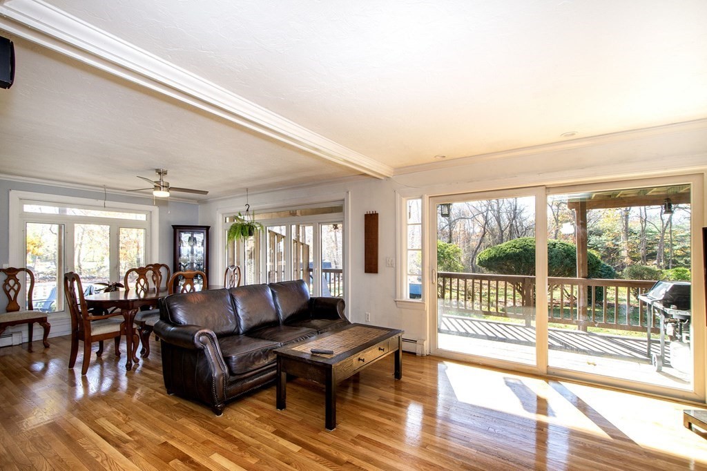 213 Beaver Dam Road Scituate, MA 02066 - Photo 20 of 28 a living room with furniture and a table