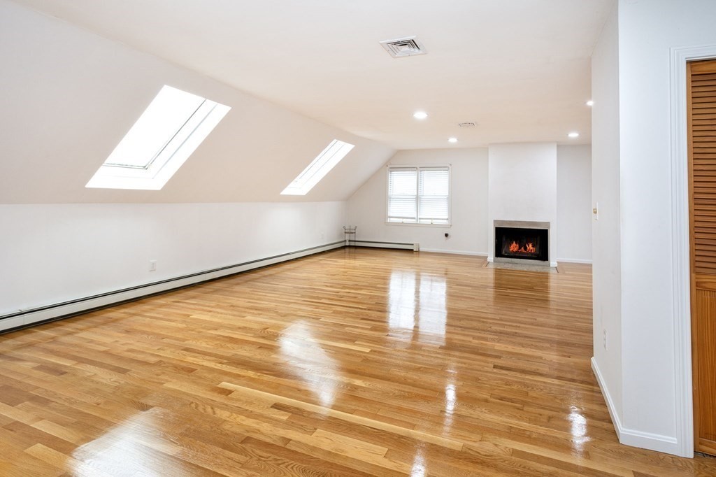 213 Beaver Dam Road Scituate, MA 02066 - Photo 7 of 28 a view of a living room with an empty space
