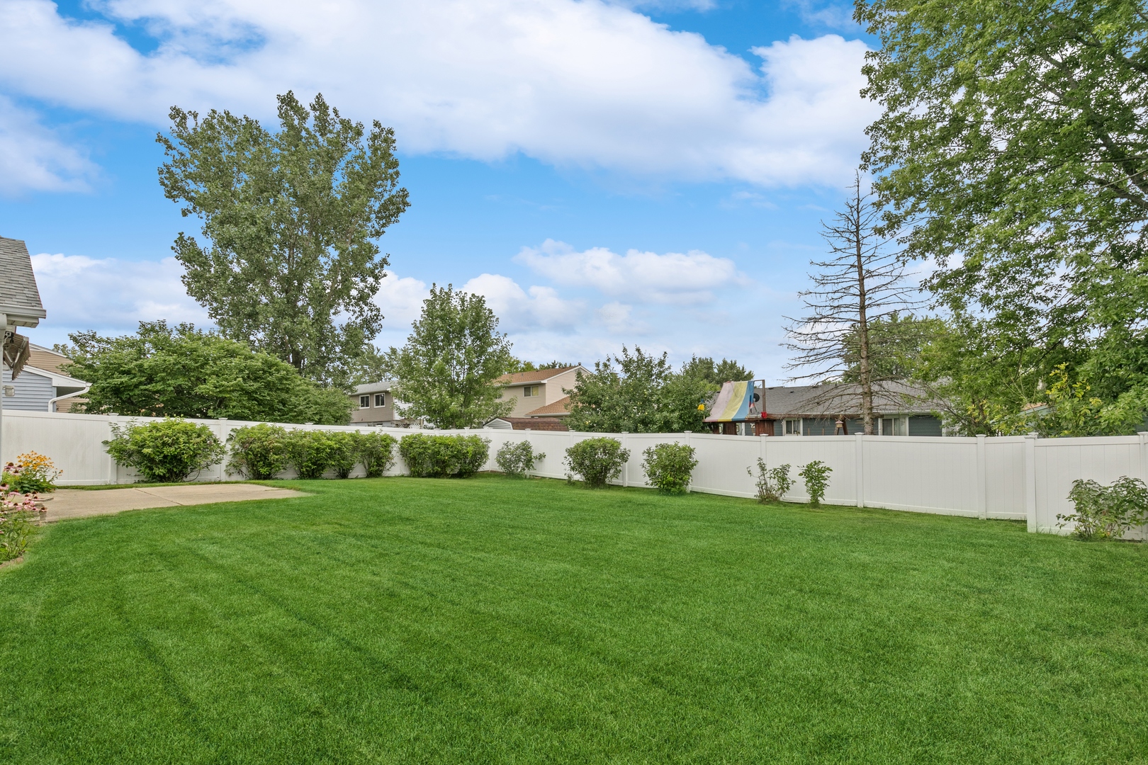 27 Joslyn Drive Elgin, IL 60120 - Photo 17 of 17 a view of yard with swimming pool and green space
