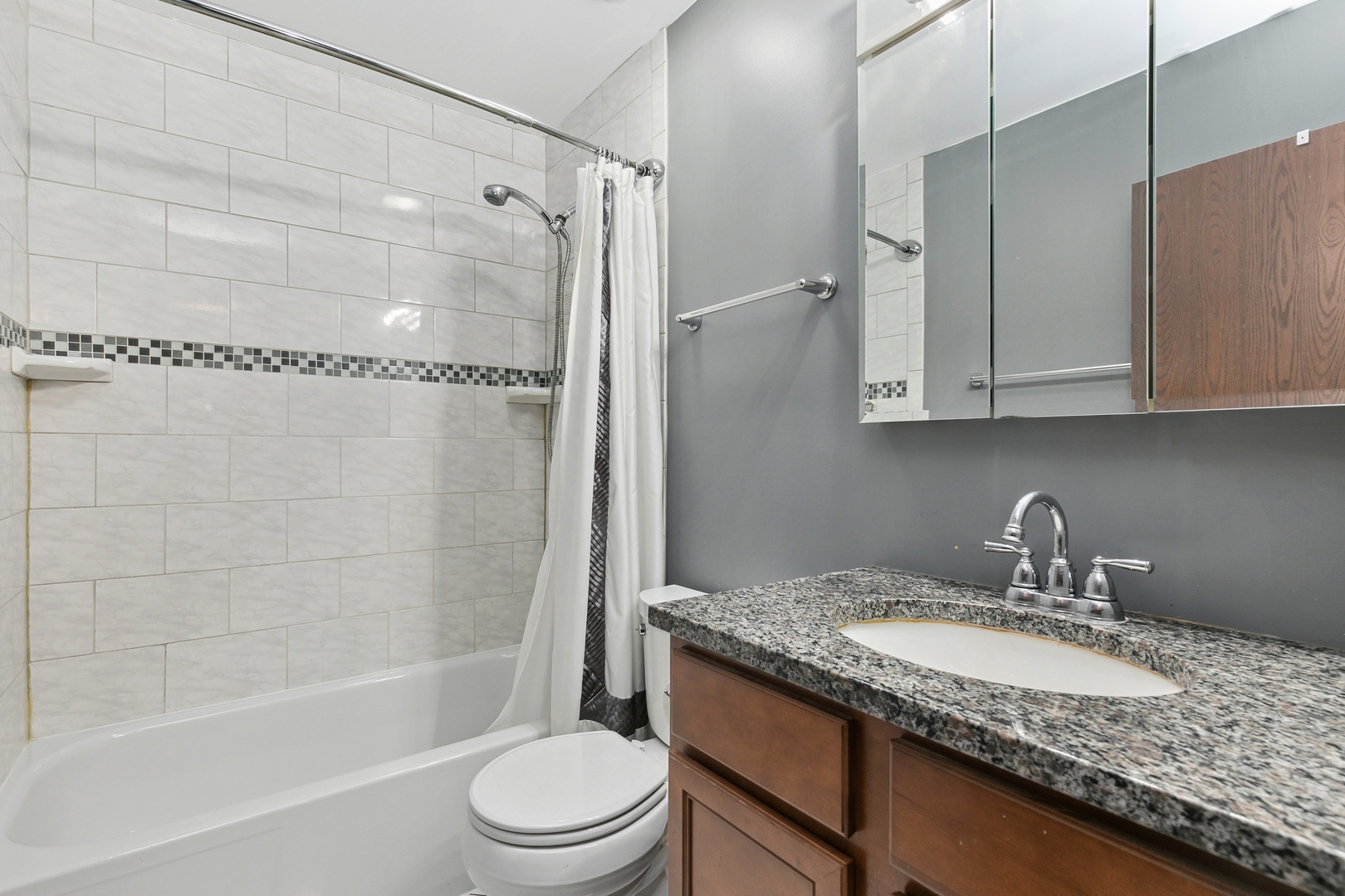 27 Joslyn Drive Elgin, IL 60120 - Photo 9 of 17 a bathroom with a granite countertop sink toilet and shower
