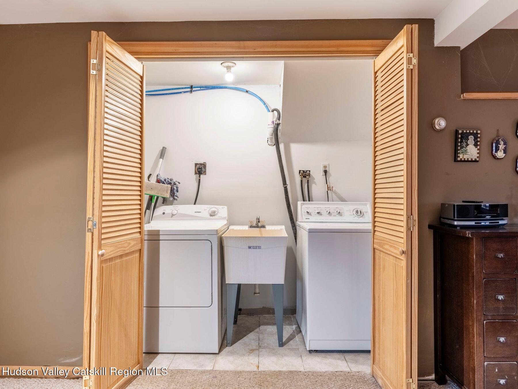 83 Lawrence Road Jewett, NY 12442 - Photo 31 of 52 a bathroom with a sink and a mirror
