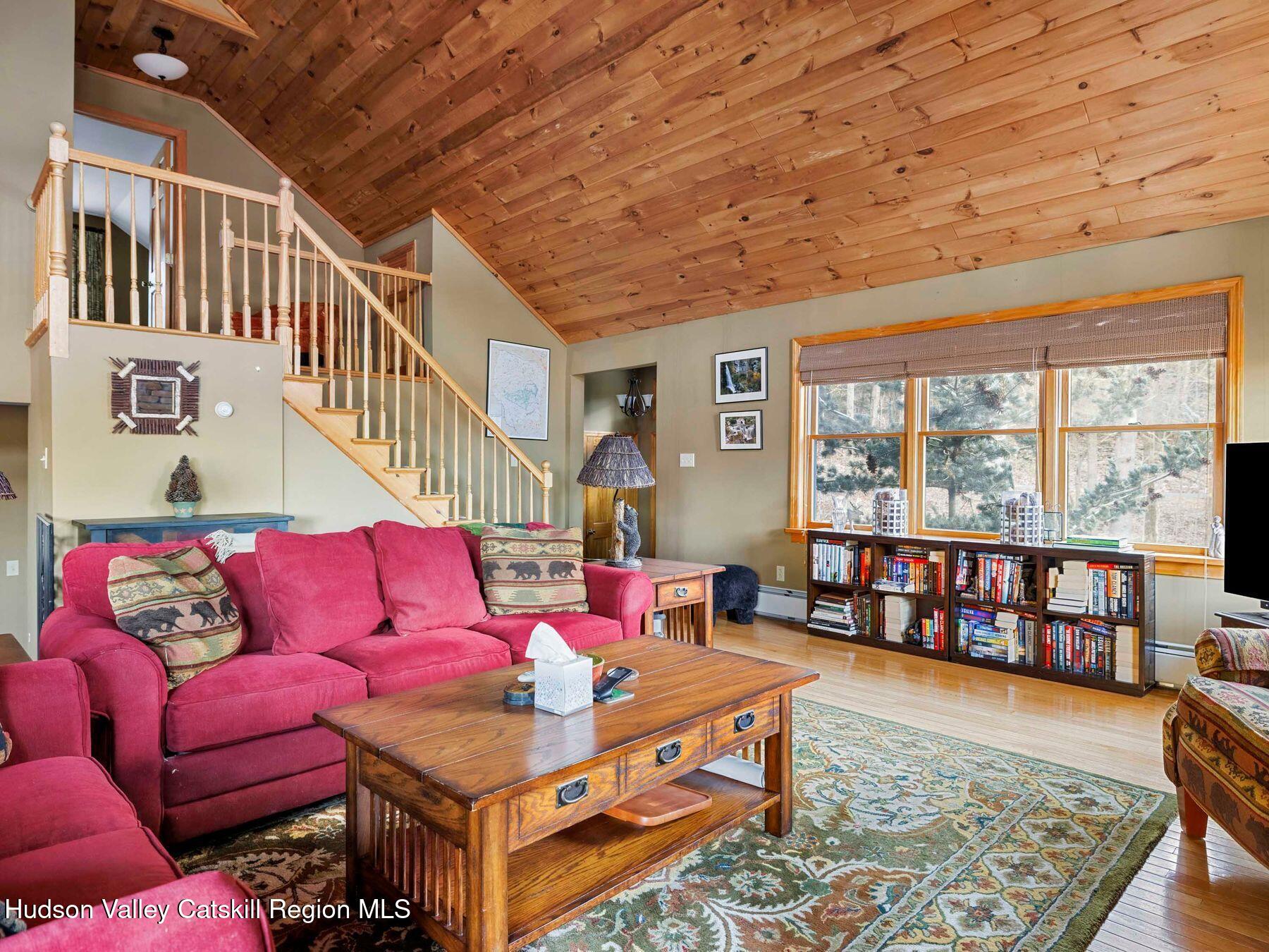 83 Lawrence Road Jewett, NY 12442 - Photo 4 of 52 a living room with furniture and a window