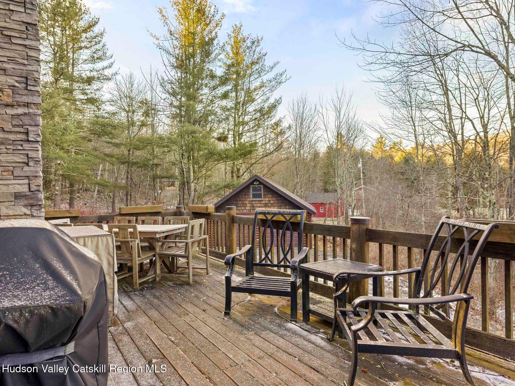 83 Lawrence Road Jewett, NY 12442 - Photo 43 of 52 a view of a patio on wooden floor