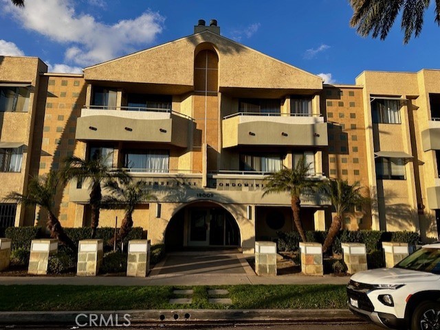 a front view of a building with glass windows