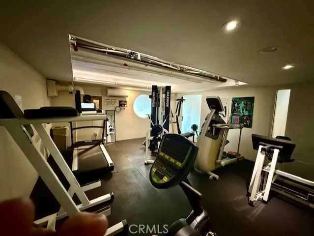 a gym room with gym equipment