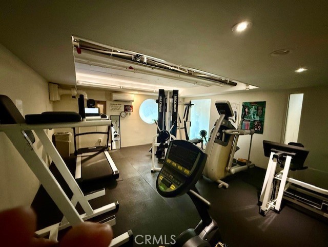 19009 Sherman Way, Unit 34 Reseda, CA 91335 - Photo 20 of 27 a gym room with gym equipment