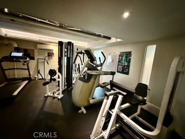 19009 Sherman Way, Unit 34 Reseda, CA 91335 - Photo 21 of 27 a view of a room with gym equipment