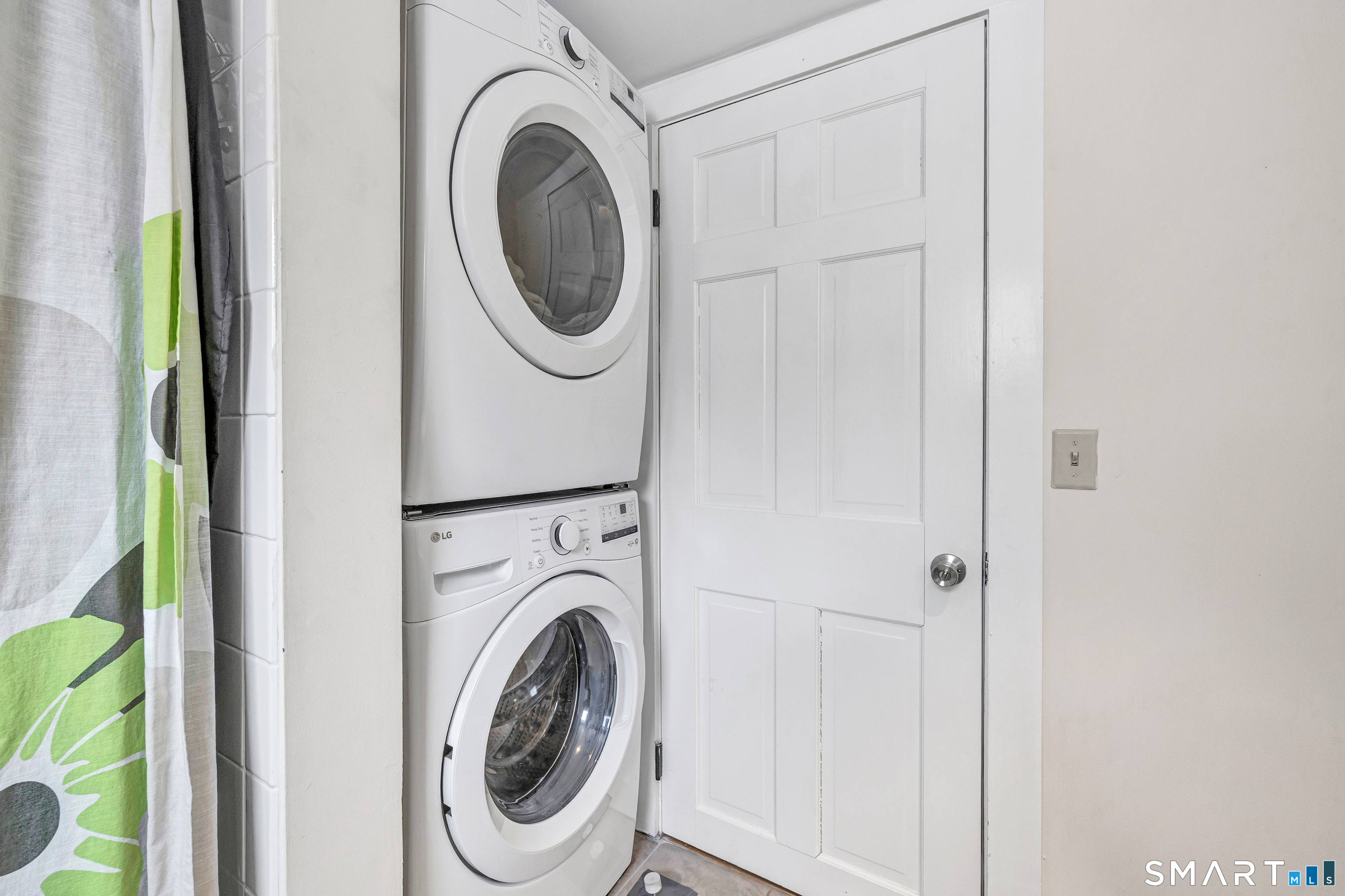 274 Lyons Plain Road Weston, CT 06883 - Photo 13 of 40 a utility room with dryer and washer
