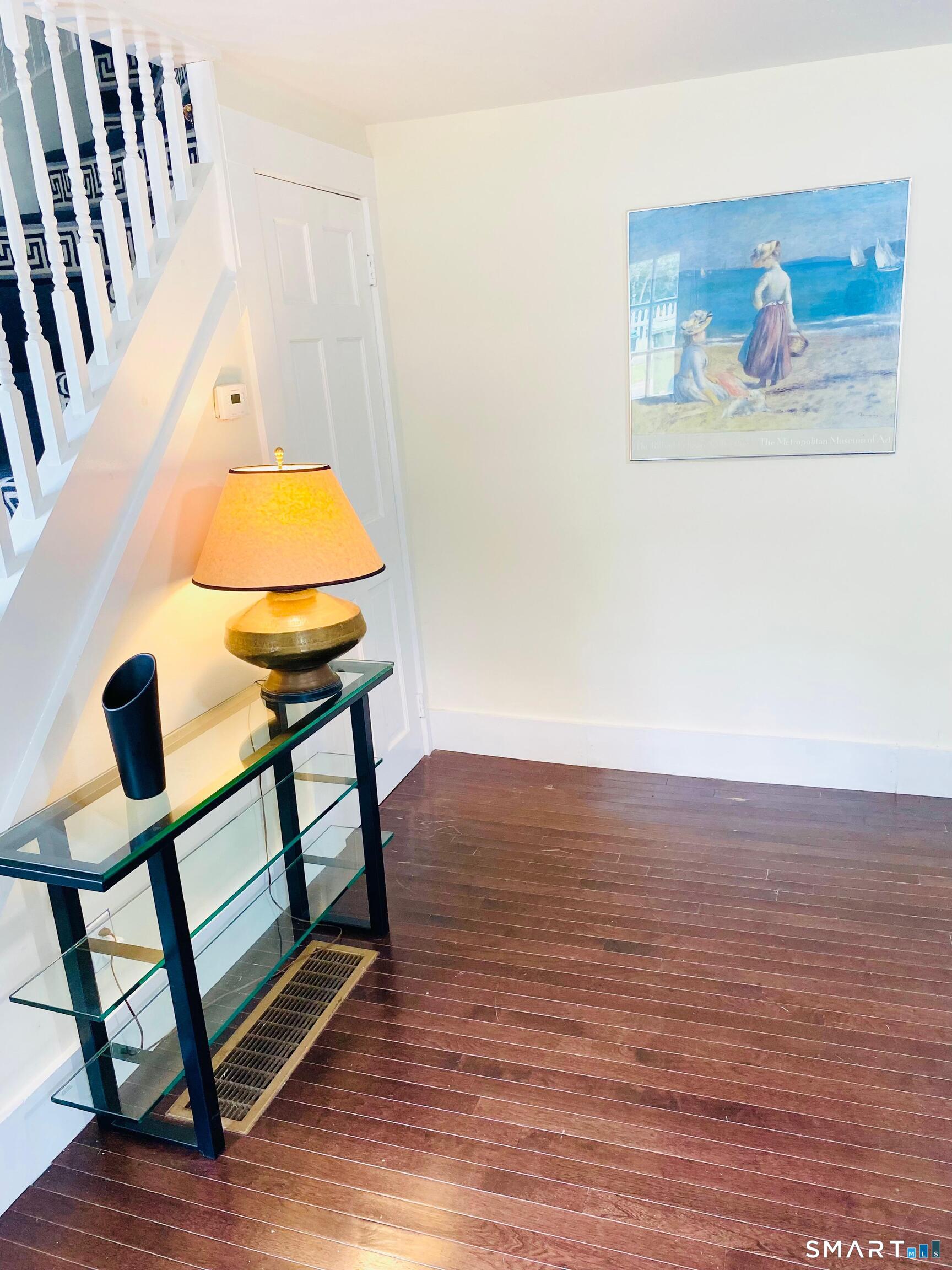 274 Lyons Plain Road Weston, CT 06883 - Photo 23 of 40 a view of staircase and wooden floor