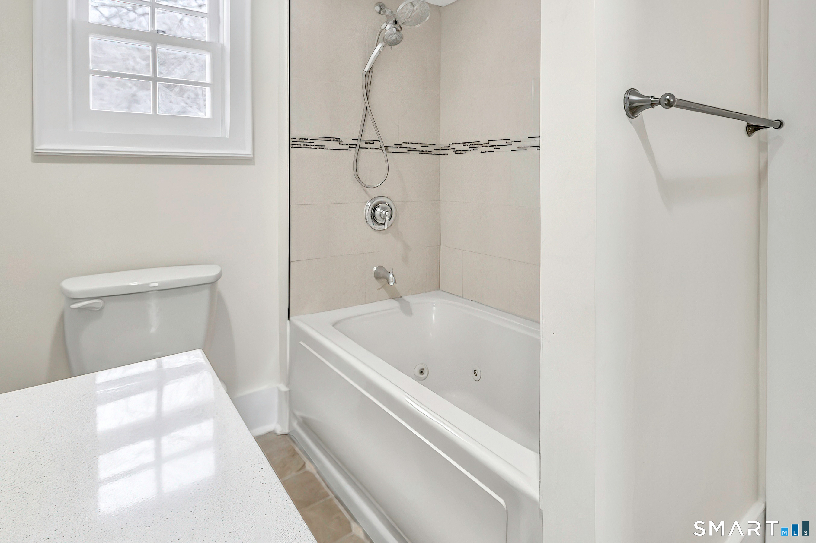 274 Lyons Plain Road Weston, CT 06883 - Photo 36 of 40 a bathroom with a bathtub and a toilet