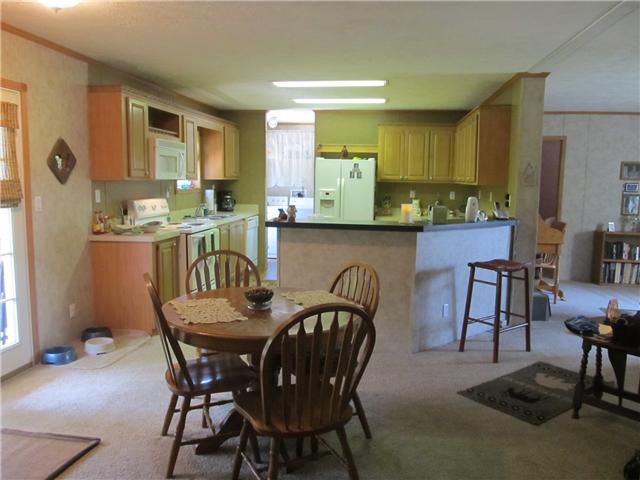 1208 Hurricane Road Tullahoma, TN 37388 - Photo 2 of 13 Spacious kitchen with space for dining. All kitchen appliances to remain with the house.