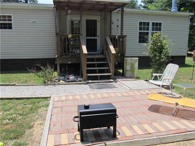 1208 Hurricane Road Tullahoma, TN 37388 - Photo 9 of 13 Covered back deck with brick patio