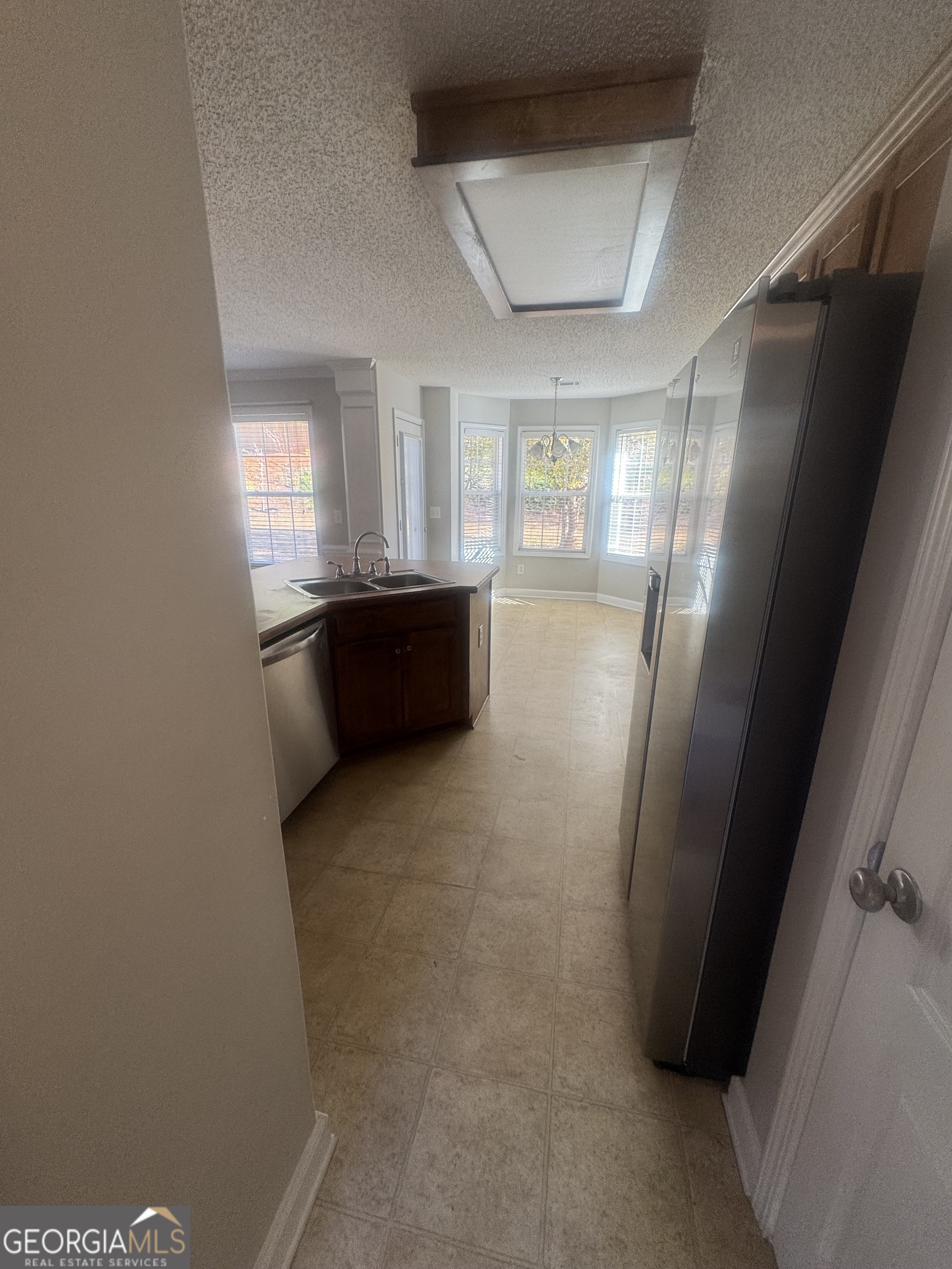 180 Laurel Oaks Lane Jefferson, GA 30549 - Photo 18 of 26 a large bathroom with a tub sink and window
