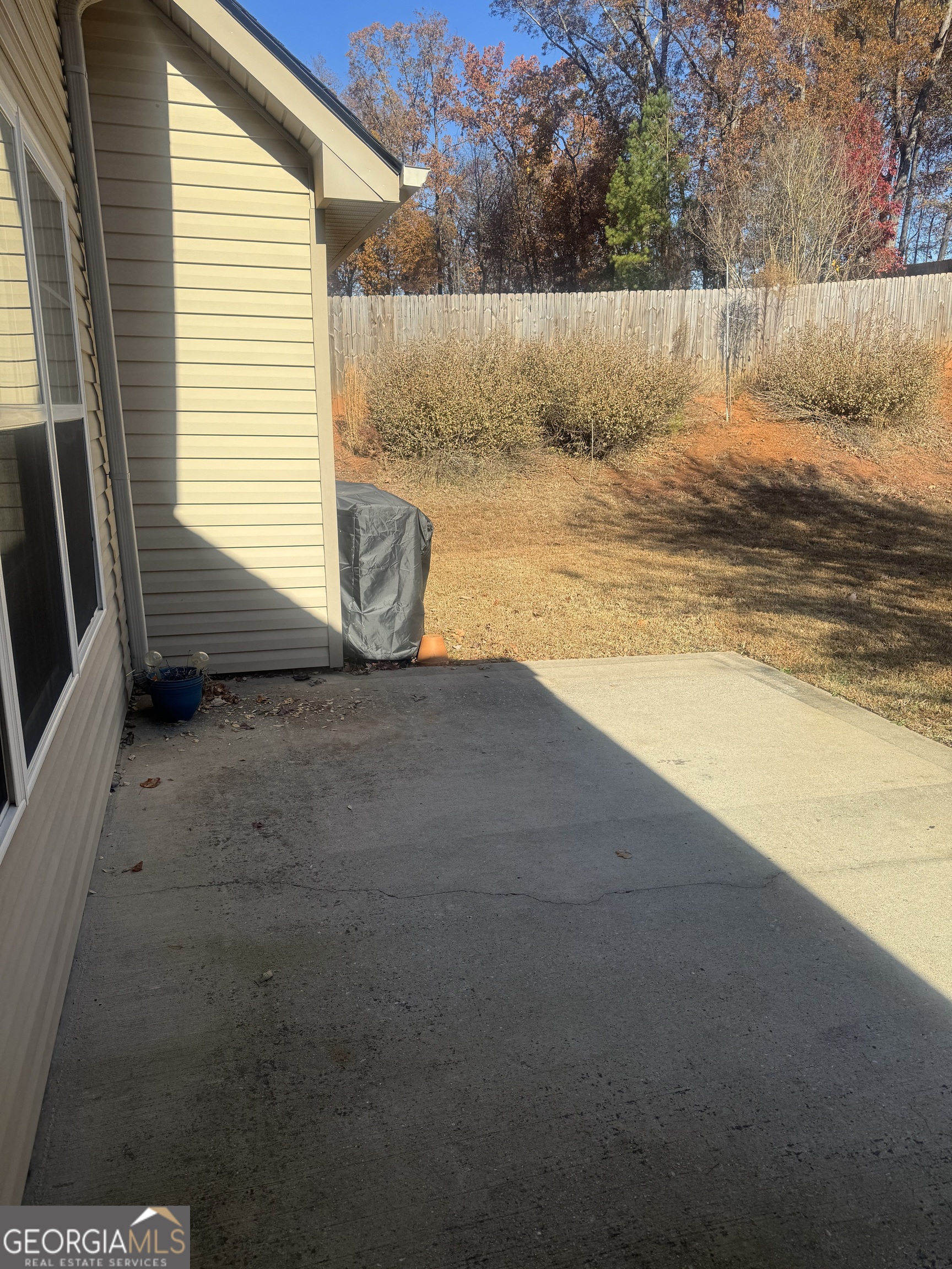 180 Laurel Oaks Lane Jefferson, GA 30549 - Photo 4 of 26 a view of a backyard of the house