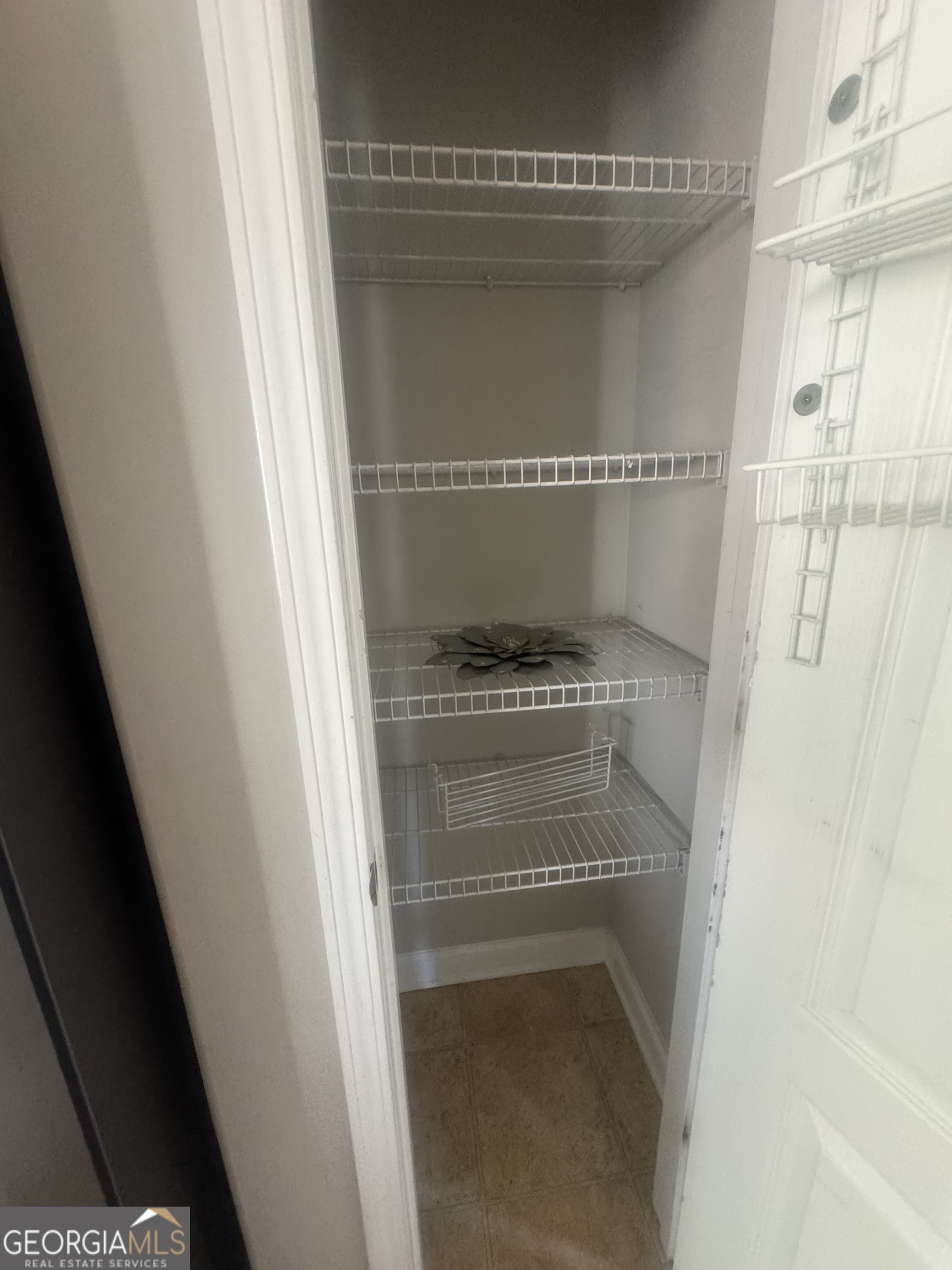 180 Laurel Oaks Lane Jefferson, GA 30549 - Photo 10 of 26 a view of walk in closet