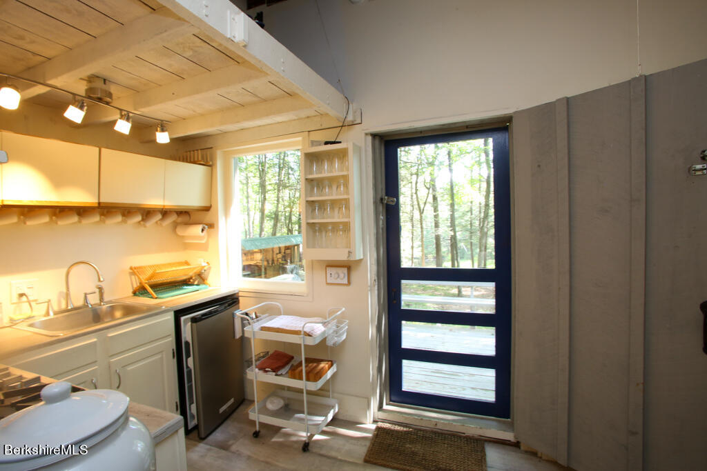 7 Mary Lyon Road Buckland, MA 01370 - Photo 40 of 60 a room with a large window and furniture