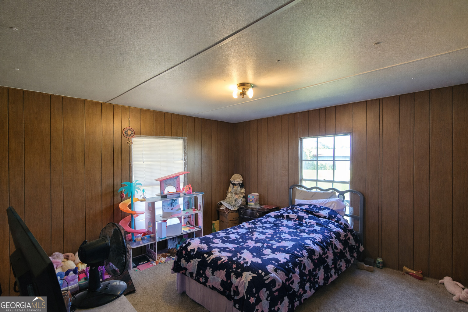 200 Homer Stephens Road Cornelia, GA 30531 - Photo 14 of 16 a bedroom with bed and a window