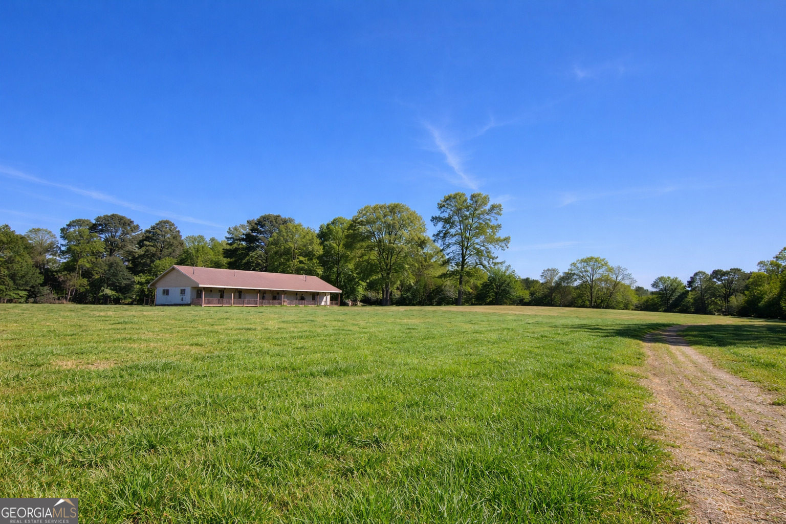 200 Homer Stephens Road Cornelia, GA 30531 - Photo 5 of 16 a backyard of a house with outdoor seating