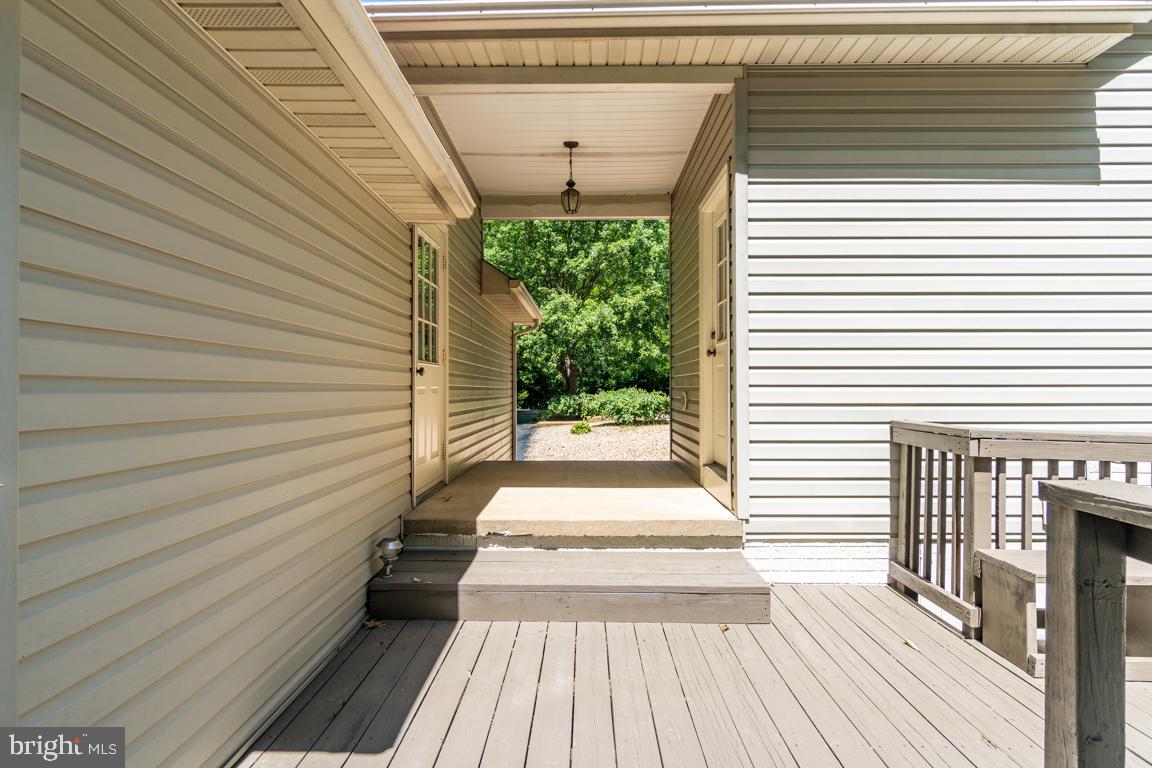 7084 Caledon Road King George, VA 22485 - Photo 14 of 83 Keep the dirt out and never get wet with breezeway