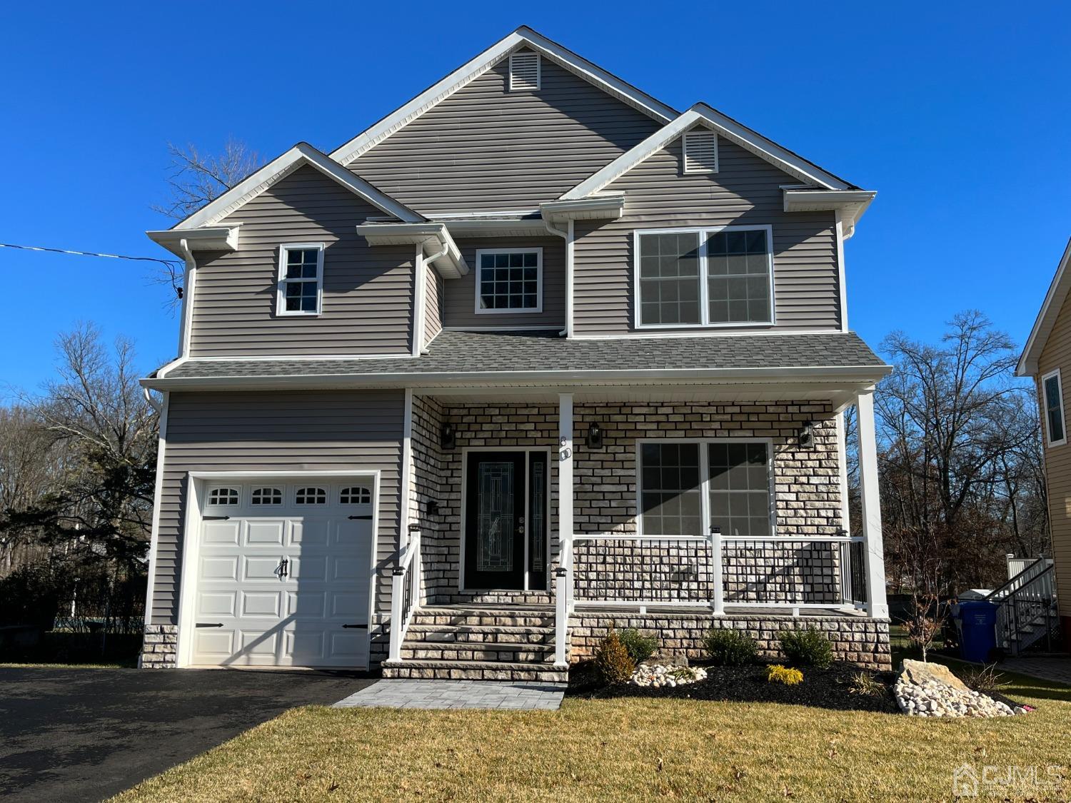 80 Kimberly Road Colonia, NJ 07067 - Photo 1 of 33 a front view of a house with a yard