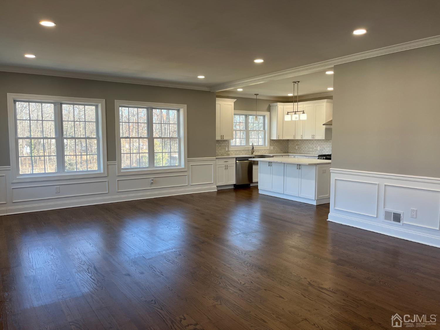 80 Kimberly Road Colonia, NJ 07067 - Photo 17 of 33 an empty room with wooden floor and windows