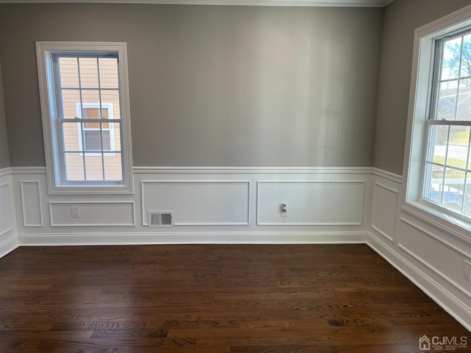 80 Kimberly Road Colonia, NJ 07067 - Photo 20 of 33 a view of an empty room with wooden floor and a window