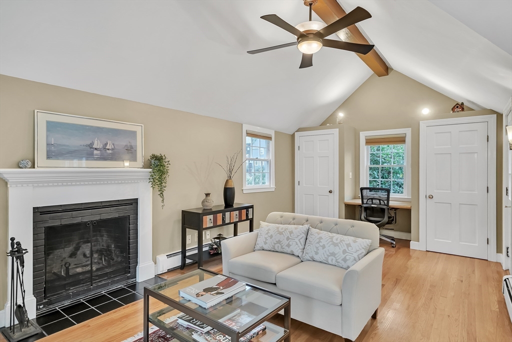2270 Massachusetts Avenue Lexington, MA 02421 - Photo 11 of 34 a living room with furniture and a fireplace
