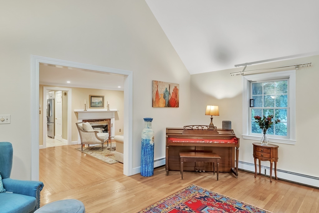 2270 Massachusetts Avenue Lexington, MA 02421 - Photo 13 of 34 a living room with furniture a piano and a window