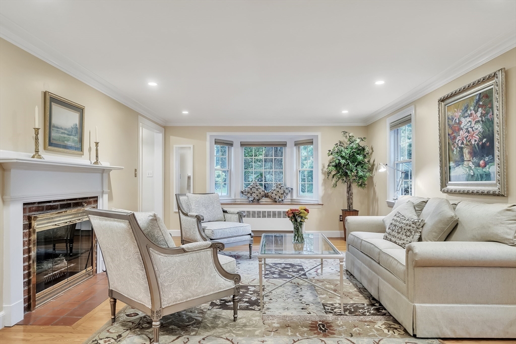 2270 Massachusetts Avenue Lexington, MA 02421 - Photo 2 of 34 a living room with furniture and a fireplace