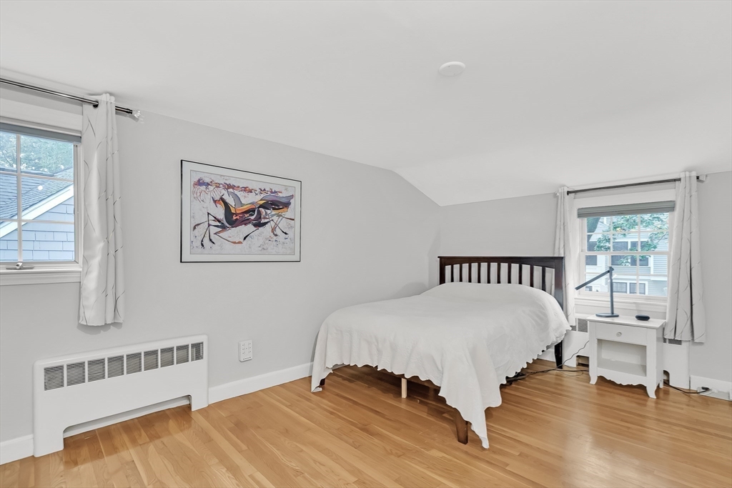 2270 Massachusetts Avenue Lexington, MA 02421 - Photo 21 of 34 a bedroom with a bed and window