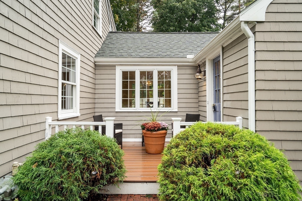 2270 Massachusetts Avenue Lexington, MA 02421 - Photo 24 of 34 a front view of a house with garden