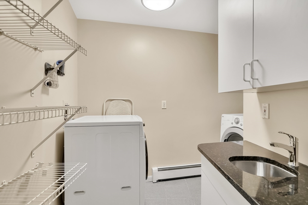 2270 Massachusetts Avenue Lexington, MA 02421 - Photo 28 of 34 a utility room with dryer and washer