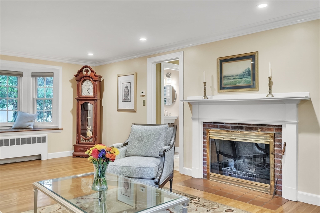2270 Massachusetts Avenue Lexington, MA 02421 - Photo 3 of 34 a living room with furniture and a fireplace