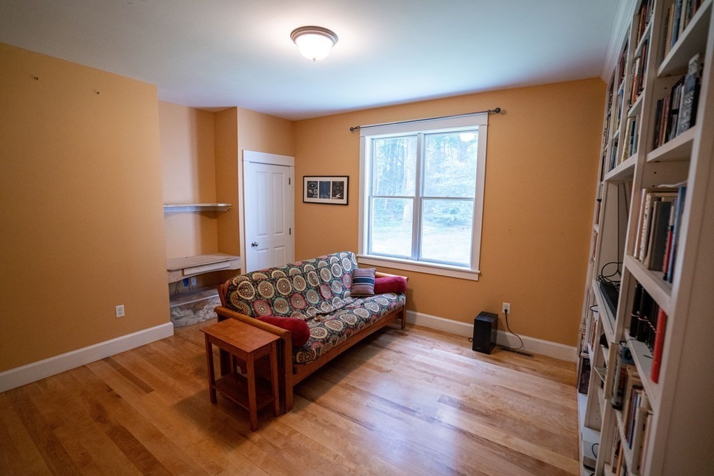 16 Long Hill Road Leverett, MA 01054 - Photo 15 of 38 a living room with furniture and a window