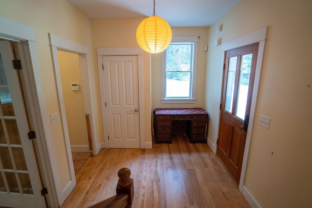 16 Long Hill Road Leverett, MA 01054 - Photo 17 of 38 a room with window and wooden floor