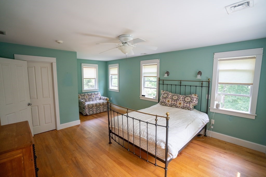 16 Long Hill Road Leverett, MA 01054 - Photo 21 of 38 a bedroom with a bed and window